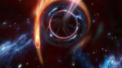 صورة تعبيرية وفرتها مجلة "نيتشر" في 30 تشرين الثاني/نوفمبر 2022 لدفق ضوئي منبثق من ثقب أسود يبتلع نجماً