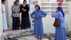 أسرة مسيحية نزحت إلى قرة قوش في محافظة نينوى - أ ف ب
