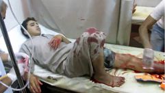 سرمين سورية - ريف إدلب - قصف مسجد - علاج فتى جريح 4-7-2014