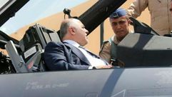 رئيس الوزراء العراقي حيدر العبادي في قمرة طائرة إف16 ـ السومرية نيوز