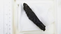 المخطوطة المحترقة التي تمت قراءتها في مختبر مخطوطات البحر الميت التابع لدائرة الاثار الاسرائيلية في 