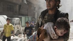 عشرات الأطفال سقطوا جراء قصف طائرات التحالف على مناطق بسوريا - أ  ف ب