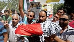 تشييع جثمان الرضيع علي الدوابشة في نابلس فلسطين ـ الأناضول