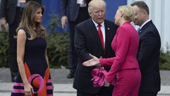 موقف محرج ترامب مع زوجة رئيس بولونيا- أ ف ب