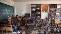 لقاء الوحدات الكردية مع النظام- جيتي