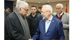 المفكر العربي معن بشور مع زعيم حزب النهضة راشد الغنوشي في مؤتمر للحوار القومي الاسلامي