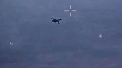 طائرة روسية تتحرش بمسير امريكية فوق سوريا- لقطية من فيديو نشره البنتاغون