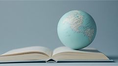 الكرة الأرضية وسط كتاب..صورة لمقال