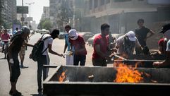متظاهرون خلال مواجهات مع الأمن المصري بذكرى رابعة - الأناضول