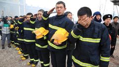 رجال إطفاء صينيين الصين حريق - أ ف ب