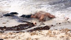 جثة مهاجر في البحر الأبيض المتوسط سواحل ليبيا - أ ف ب
