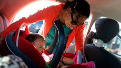 مقعد طفل في السيارة - جيتي