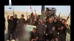 عناصر المليشيات الشيعية بعد قطع رؤوس داعش - يوتيوب
