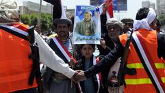 أنصار الحوثي يحتفلون بسيطرتهم على صنعاء - أنصار الحوثي يحتفلون بسيطرتهم على صنعاء - الأناضول (14)