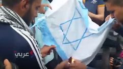 احراق العلم الاسرائيلي في القاهرة - عربي21