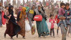 لاجئون سوريون على الحدود الأردنية- أ ف ب