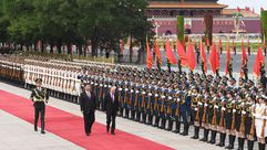 بوتين والرئيس الصيني شين جي بنغ  - جيتي