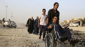 هروب سكان الموصل بعد الاشتباكات بين تنظيم الدولة والقوات العراقية