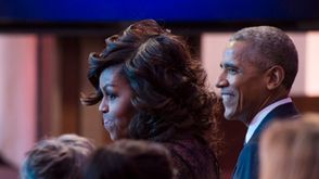 أوباما وزوجته ميشيل - أ ف ب