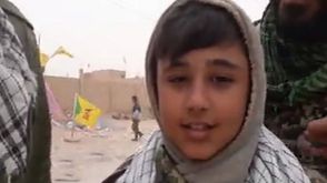 طفل ايراني يشارك في معارك البوكمال
