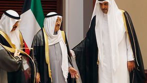 تميم بن حمد مع أمير قطر- جيتي