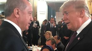 أردوغان وترامب في باريس- جيتي