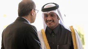 وزير الخارجية الأردني أيمن الصفدي خلال استقباله نظيره القطري في عمان بآذار/مارس الماضي- جيتي