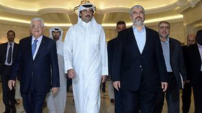 حماس قطر تميم مشعل عباس - ا ف ب