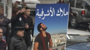 صورة أحد القتلى اللبنانيين في تشييع جنازته- تويتر