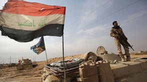 القوات العراقية في بلدة القائم بعد تحريرها من تنظيم الدولة - أ ف ب