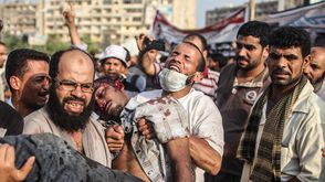 صورة الشهيد أحمد محروس في أحداث المنصة التقطها مصور الأناضول مصعب الشامي