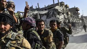 مقاتلون من قوات سوريا الديمقراطية - أ ف ب