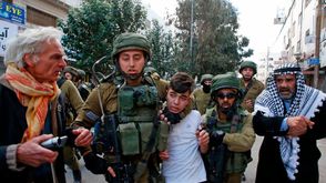 اعتقال طفل فلسطيني - جيتي