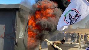 العراق حرق السفارة الامريكية  تويتر