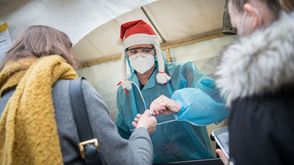 ممرضة في برلين خلال عمليات فحص للكشف عن إصابات فيروس كورونا- جيتي