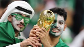 مشجعان سعوديان خلال فعاليات مونديال قطر- جيتي