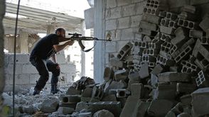 الغوطة الشرقية مقاتل من المعارضة السورية - أرشيفية