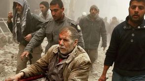 ضحابا غارات النظام السوري على الغوطة - الأناضول