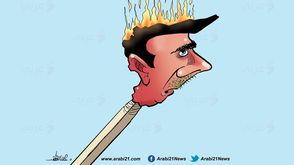 الأسد- كاريكاتير