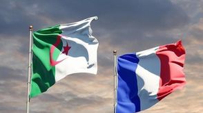 فرنسا والجزائر  أعلام  (الأناضول)