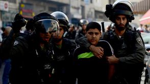 القوات الإسرائيلية تعتقل فتى في القدس بيوم الأرض - ا ف ب