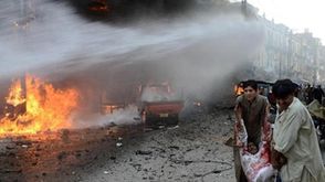 مقتل 10 وإصابة 55 في تفجيرين أمام كنيستين في باكستان