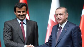 أردوغان - تركيا -  وتميم بن حمد - قطر - - أ ف ب