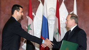 روسيا سوريا- الأسد بوتين- جيتي