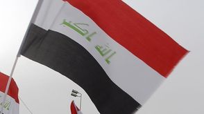 علم العراق- الأناضول