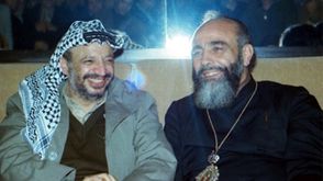 كابوتشي مع الزعيم الفلسطيني ياسر عرفات