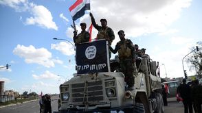 القوات العراقية في مدينة تكريت بعد السيطرة عليها وخروج داعش - أ ف ب