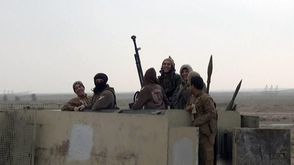 عناصر تنظيم الدولة خلال هجوم في الأنبار - أرشيفية تنظيم الدولة