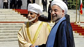 سلطان عُمان قابوس والرئيس الإيراني حسن روحاني 2013