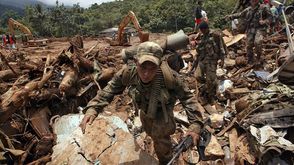 154 قتيلا وإصابة العشرات في انهيار أرضي بكولومبيا ا ف ب